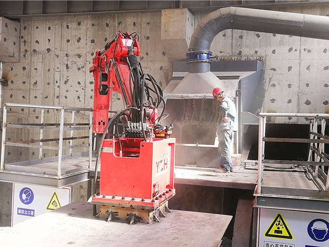 Pedestal Boom Systems Safely Dislodging Boulders At A Crusher In An Aggregate Plant